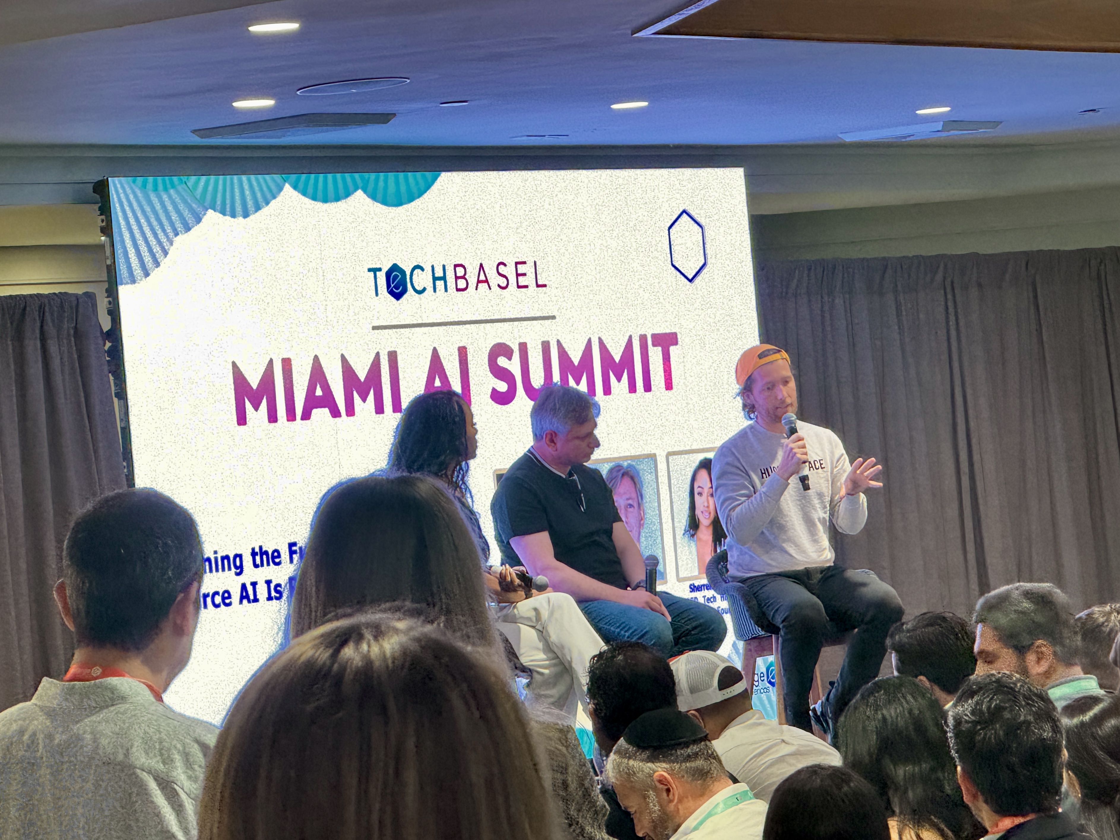 Hugging Face presenting at Tech Basel Miami about open-source AI and model democratization